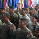 File photo from 2013 showing thirty-seven U.S. Service members from 22 different countries taking the Oath of Allegiance during a naturalization ceremony at Bagram Air Field, Parwan province, Afghanistan, July 4, 2013. (U.S. Army National Guard photo by Sgt. Anita VanderMolen/Released)